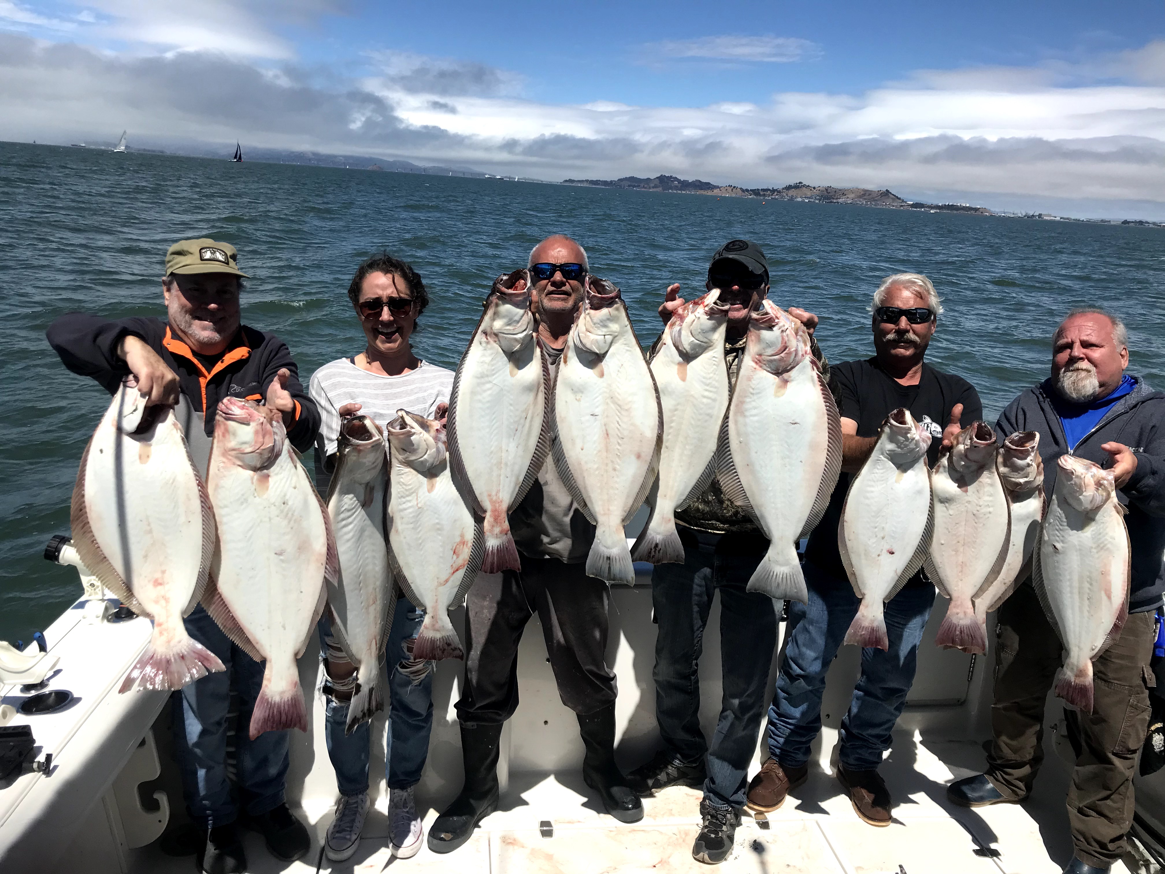 San Francisco Bay halibut striped bass fishing charter with Golden Gate Bridge views
