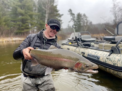 Photograph of a 27-inch pink salmon caught while fishing in Traverse City
