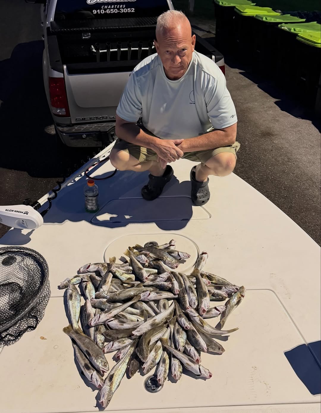 Large catch of fish displayed on boat deck at Cedar Point NC fishing charter