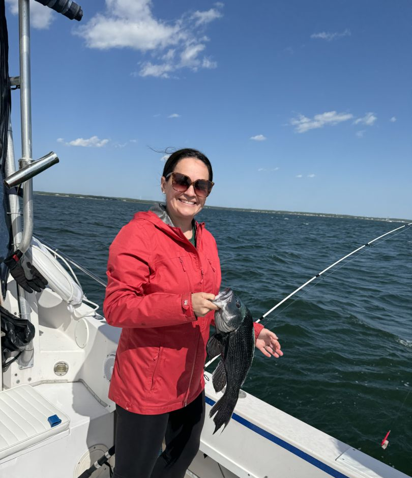 Angler posing with a 15-inch fish in Wareham