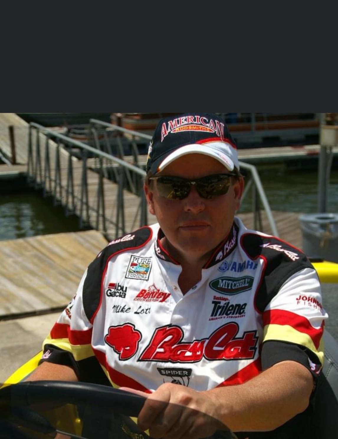 Professional angler at marina dock in Galveston TX preparing for fishing trip