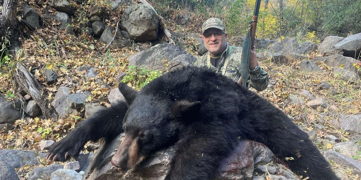 Nevada black bear hunting guide with hounds in Eureka wilderness terrain