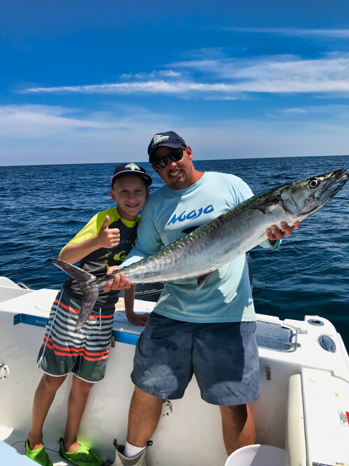 Angler with 33-inch King Mackerel fish caught in Destin