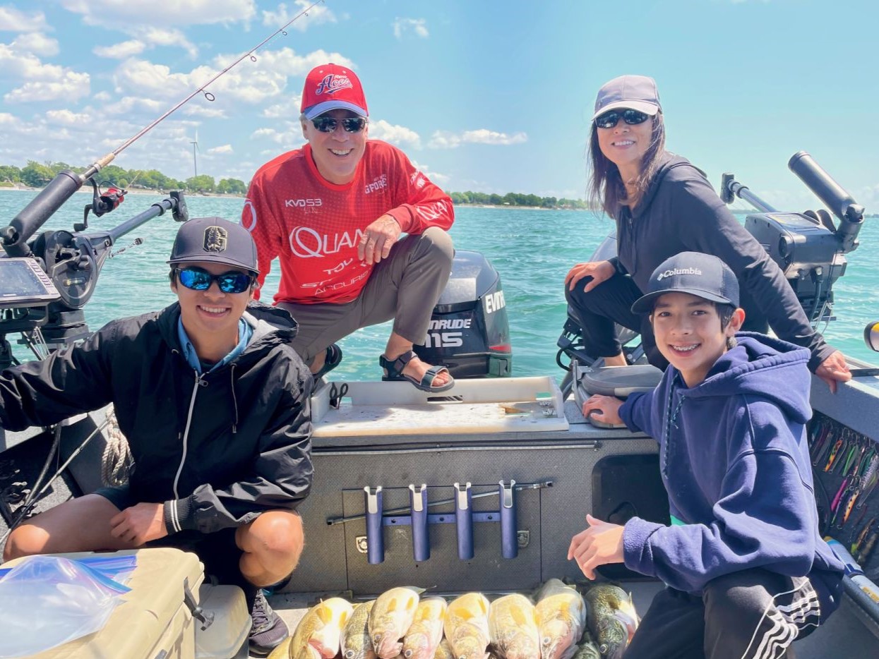 four people enjoying a great fishing trip in on