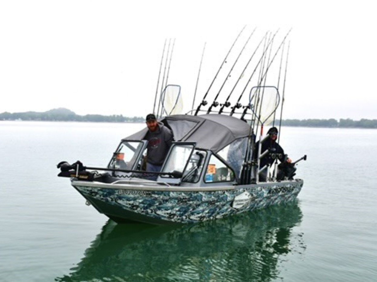 Anglers enjoying a fishing trip in South Cayuga
