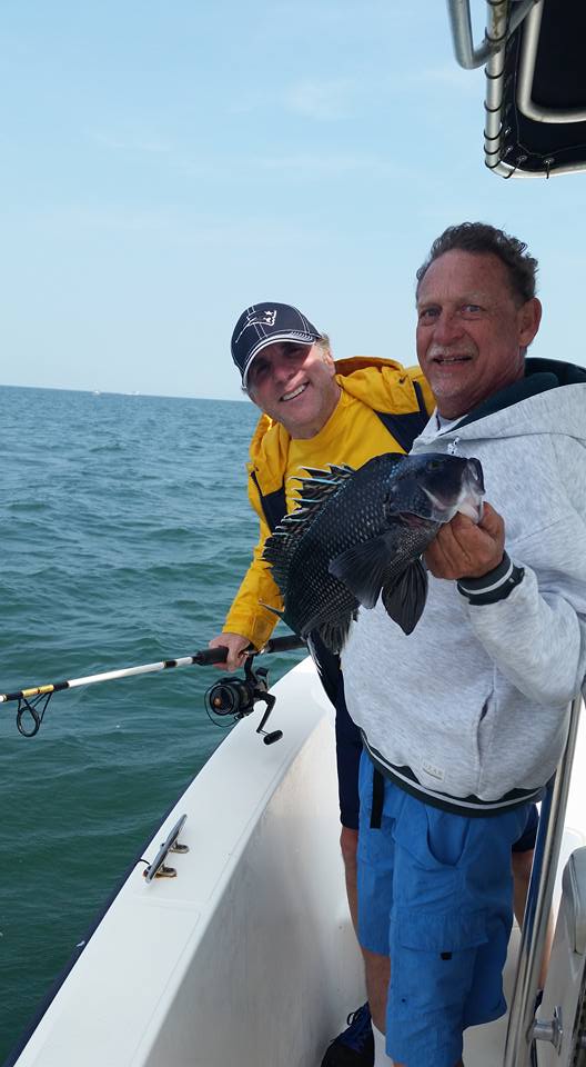 Angler with sea bass catch in MA