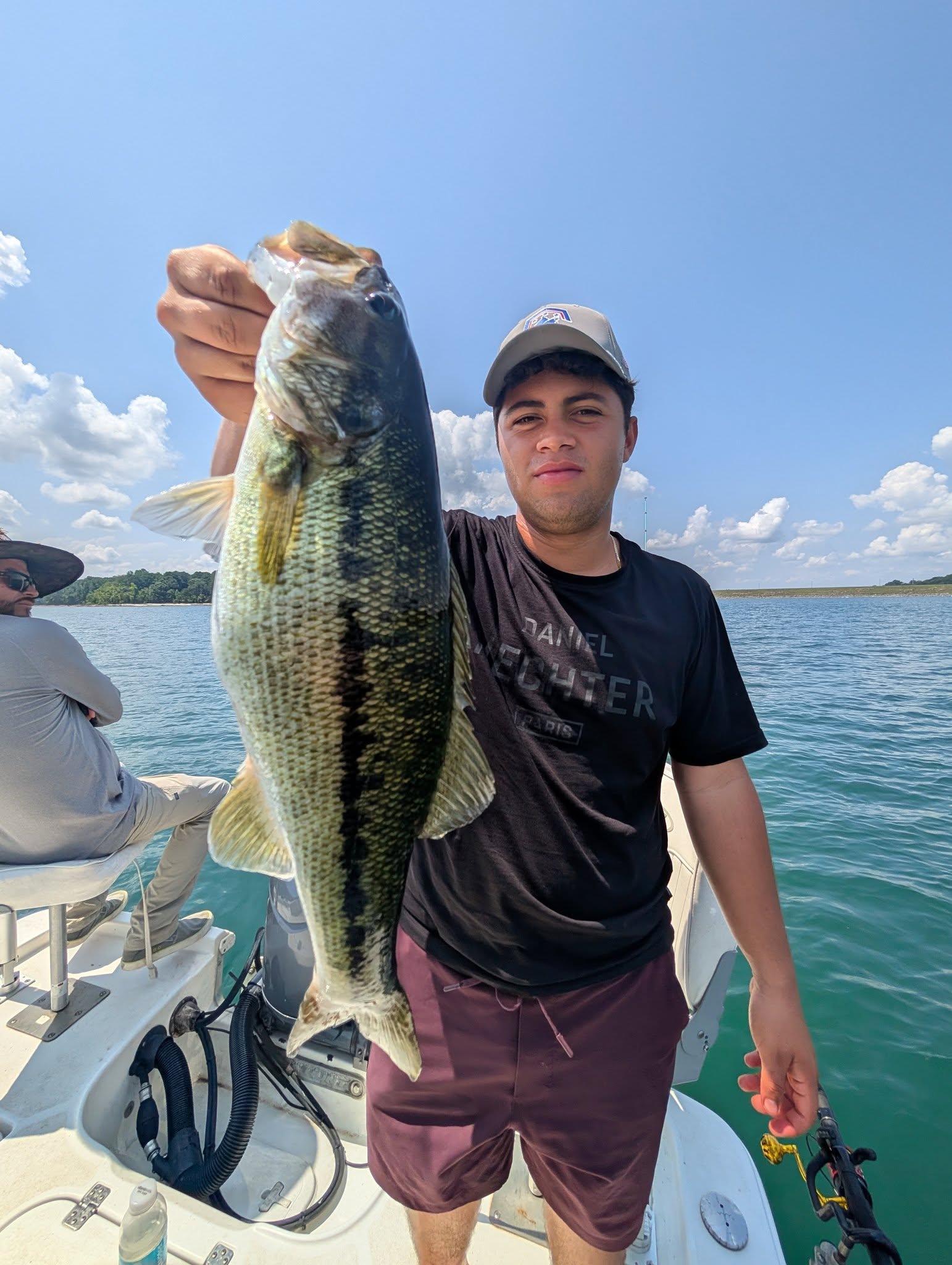 Spotted bass caught while fishing in Gainesville GA displayed on boat