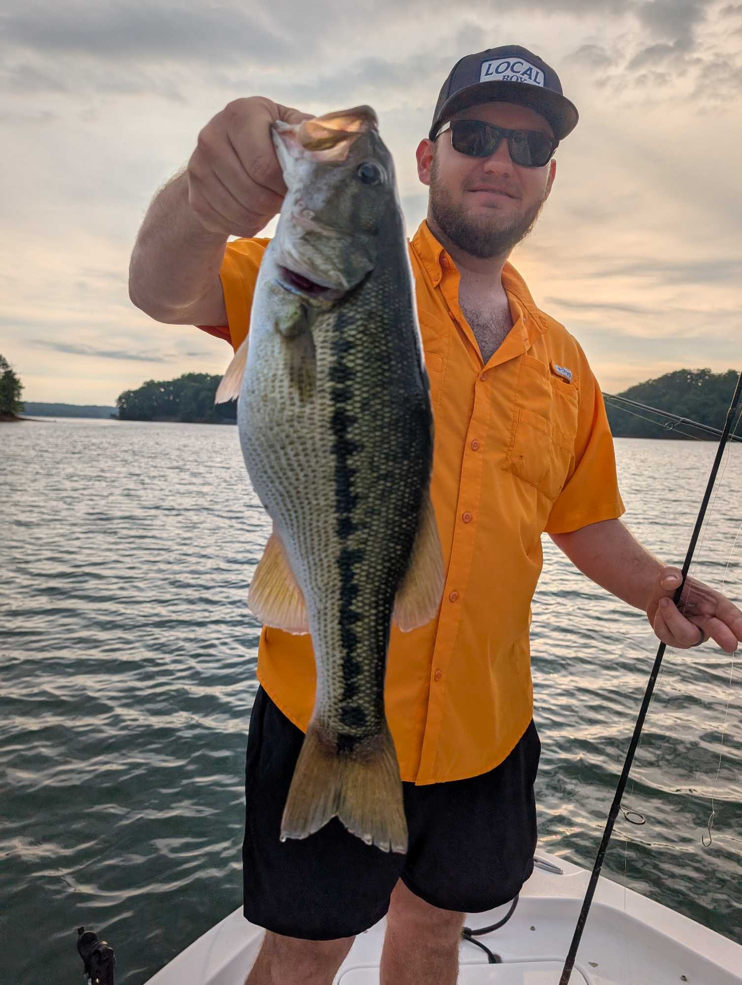 Spotted bass caught fishing in Gainesville GA held up on boat