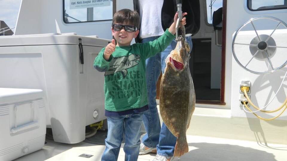Angler with a 23-inch fish in Montauk