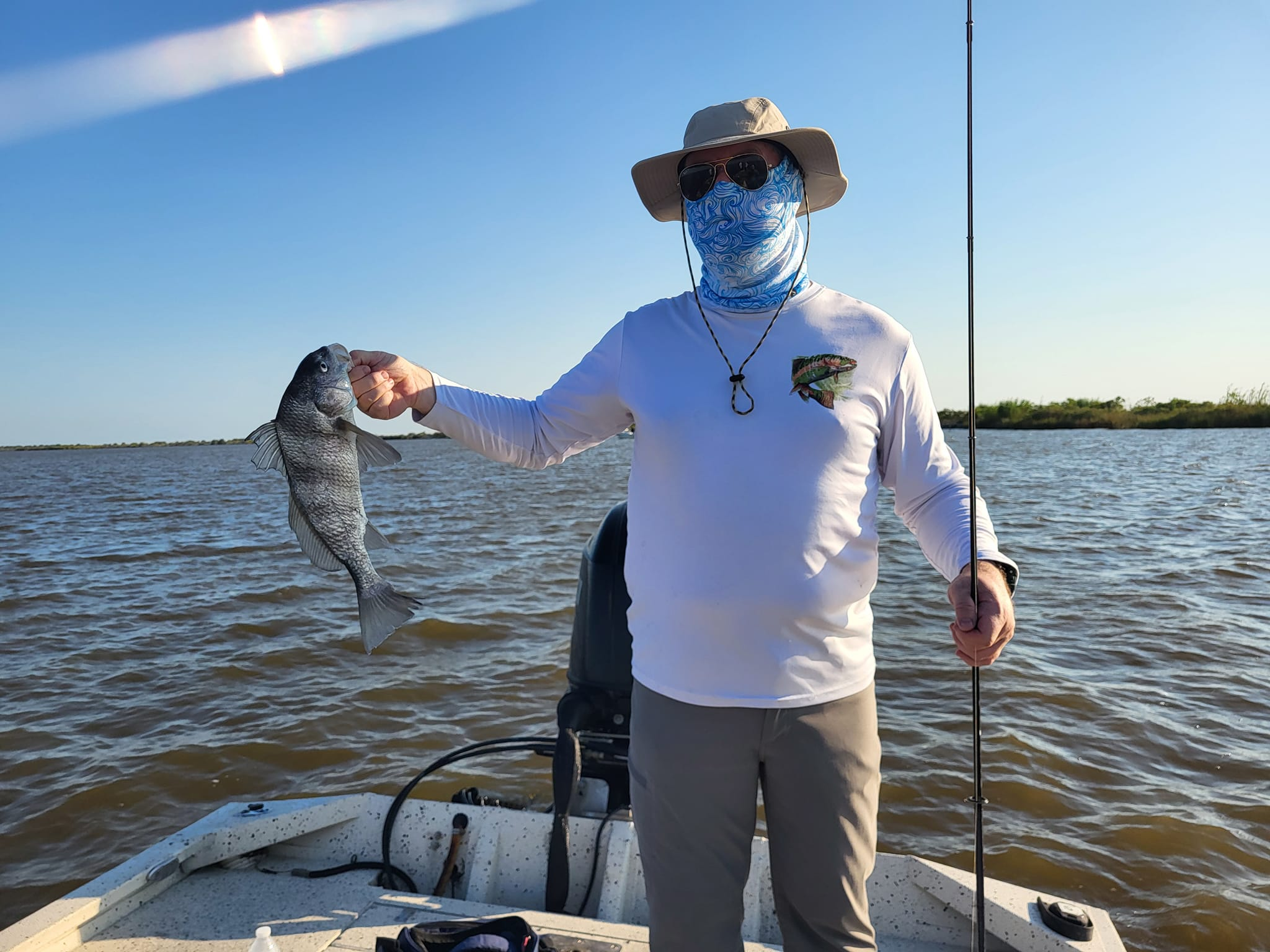 Angler with a black drum fish on Bolivar Peninsula