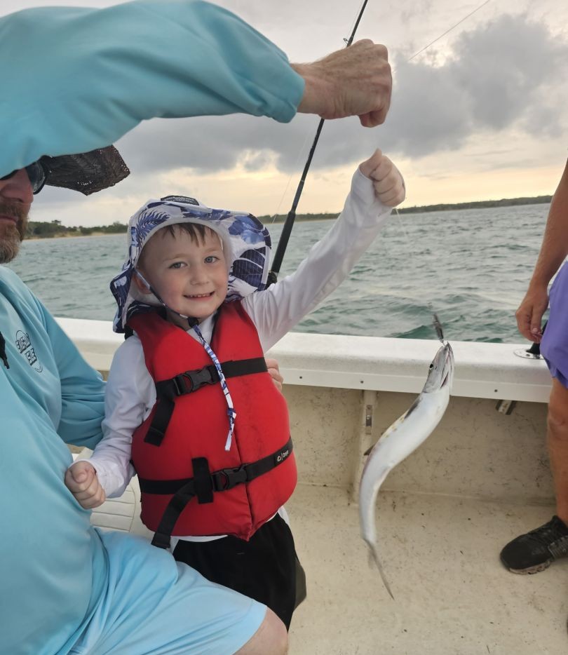 Successful fishing trip on boat in Morehead City NC with caught fish