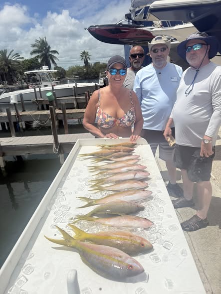 Fresh yellowfin catch displayed on cleaning table at Little Torch Key FL fishing dock