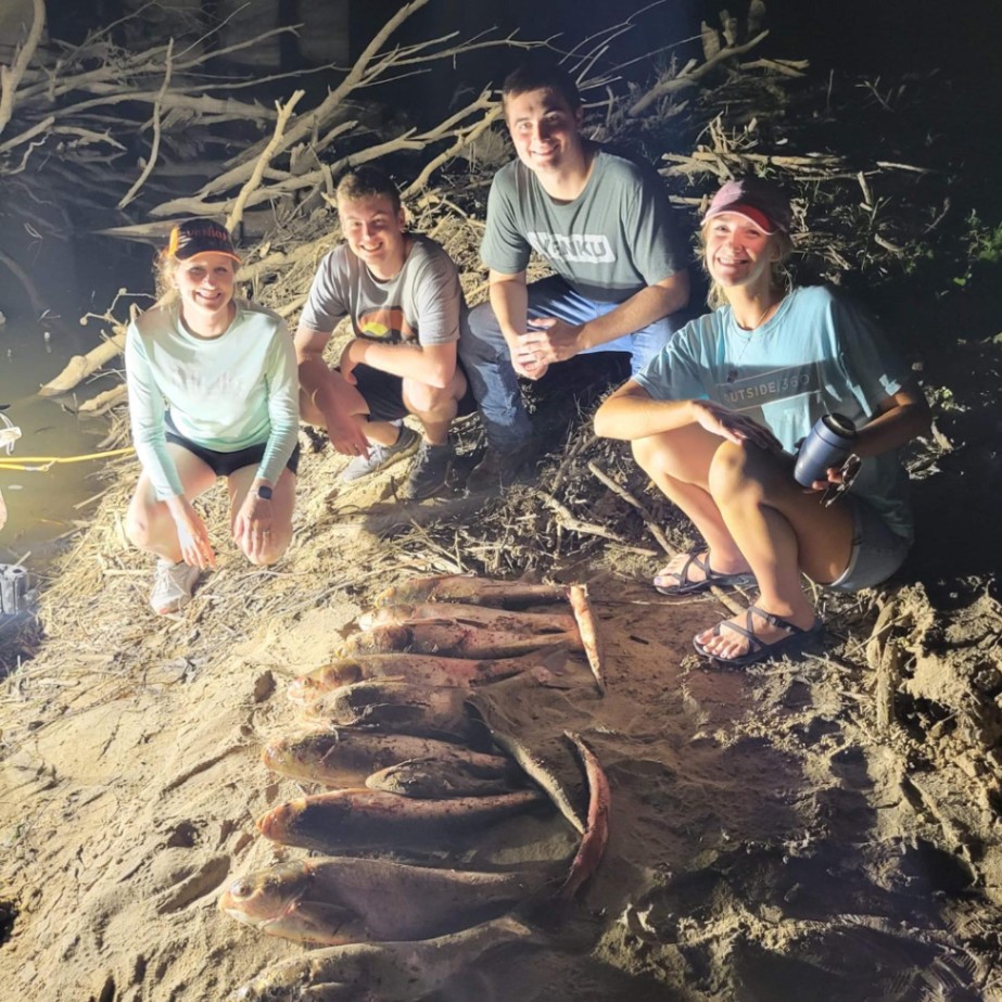 A group of 4 people fishing in Missouri