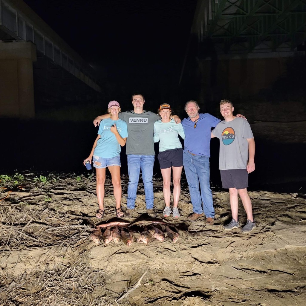 Group of 5 people fishing in St. Louis