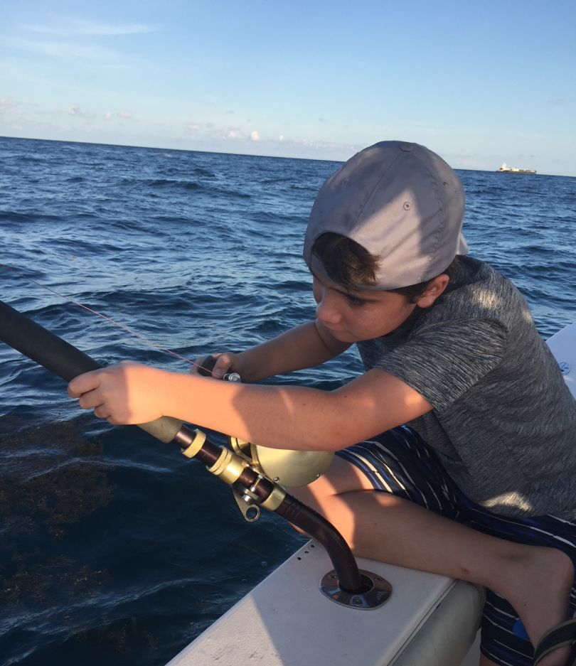 Two people fishing at Dania Beach