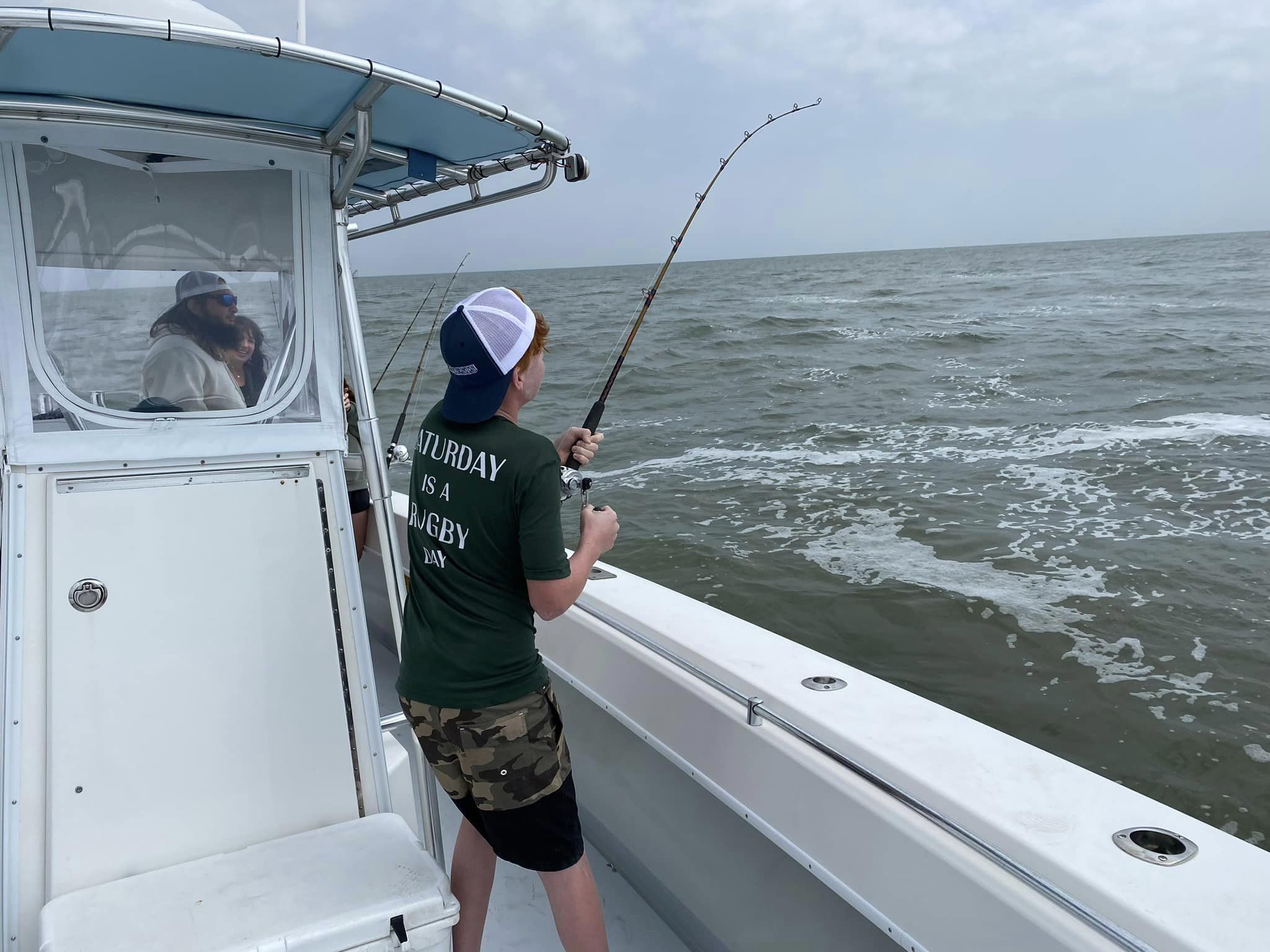 Two people fishing in Galveston