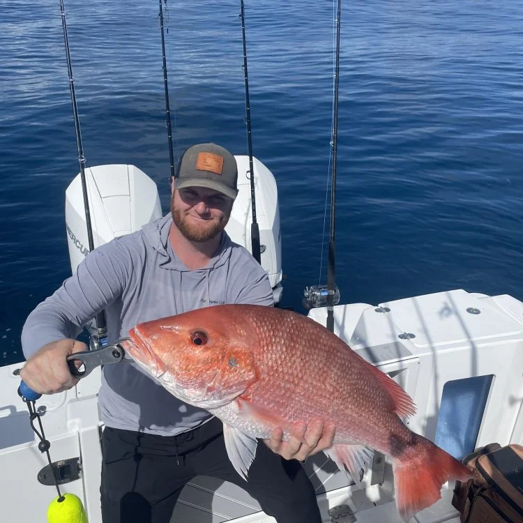 Fisherman with big 25-inch catch in Port Orange