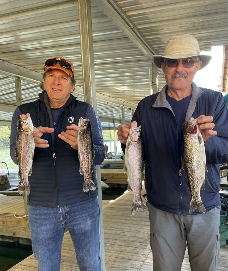 Four rainbow trout and barracuda caught during fishing trip in Branson