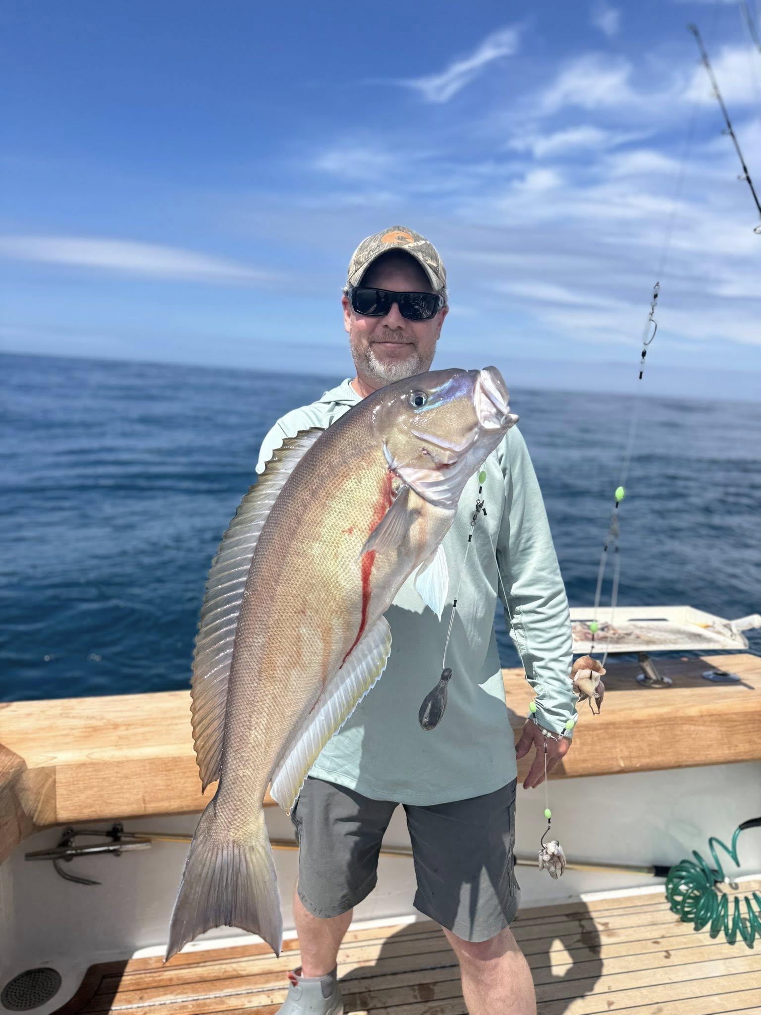 One angler with a large fish caught while fishing in Virginia Beach