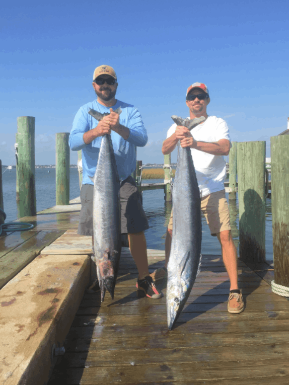 Two people fishing at Atlantic Beach