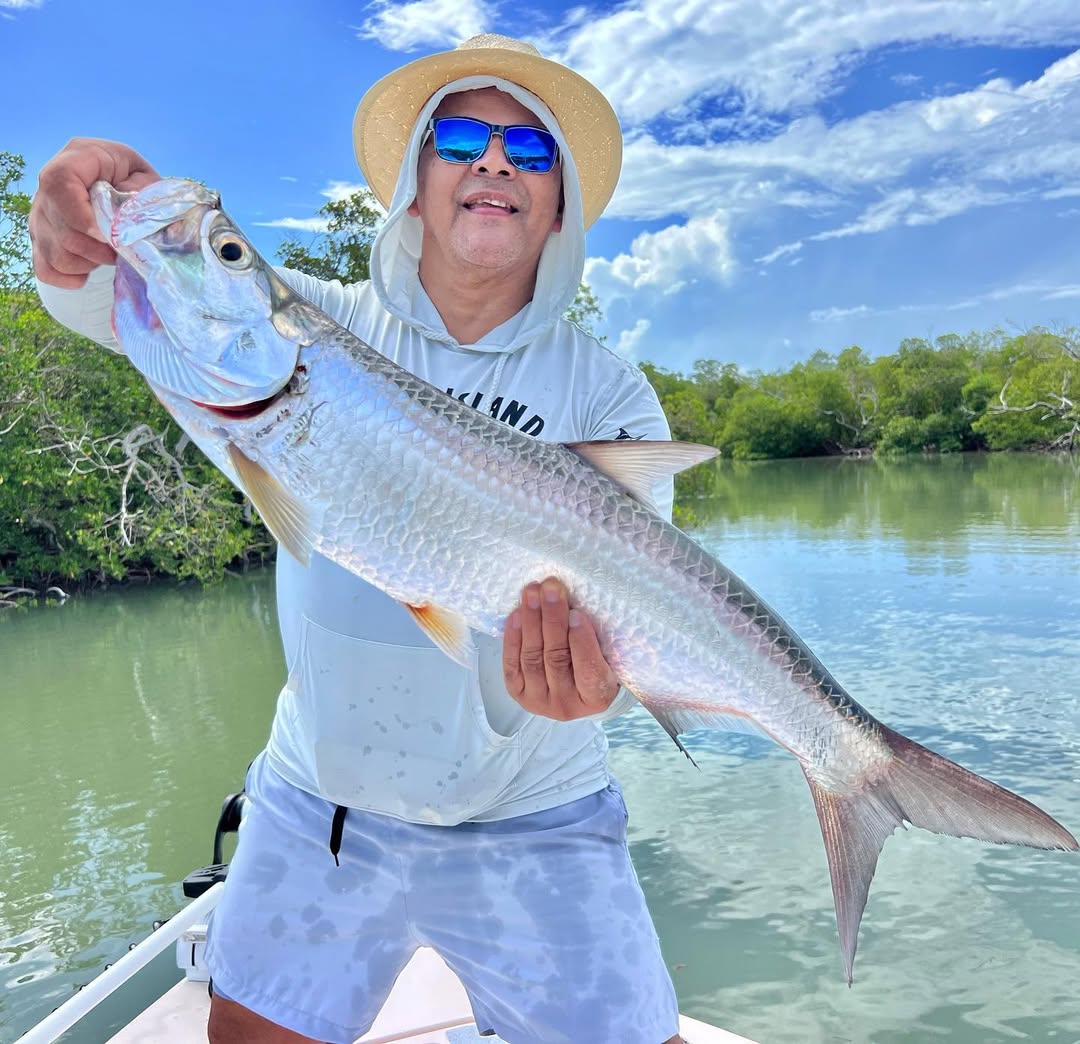 Expert angler fishing from Pathfinder boat in Naples mangroves targeting snook and redfish