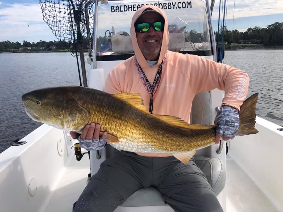 Redfish caught by an angler in Oriental