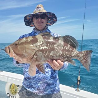 Angler with big fish at Marco Island