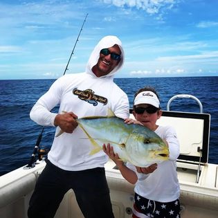 Anglers with a catch in the beautiful waters of Key West