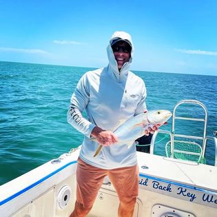 Angler holding a fishing rod in FL