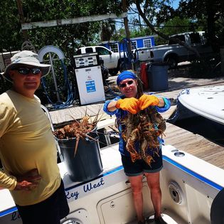 Two people enjoying a great fishing trip in Key West
