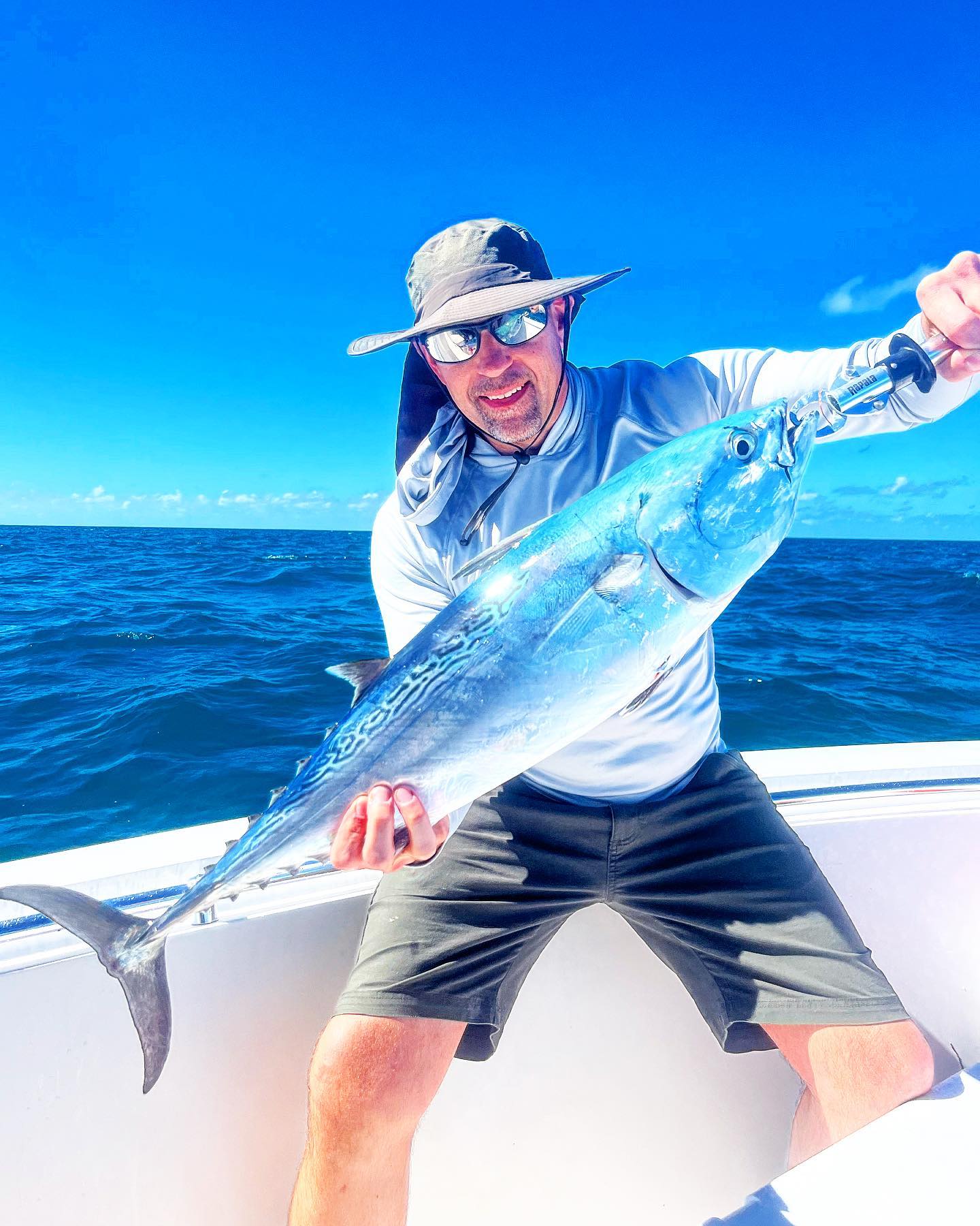 A single fisherman with a 23-inch catch from FL