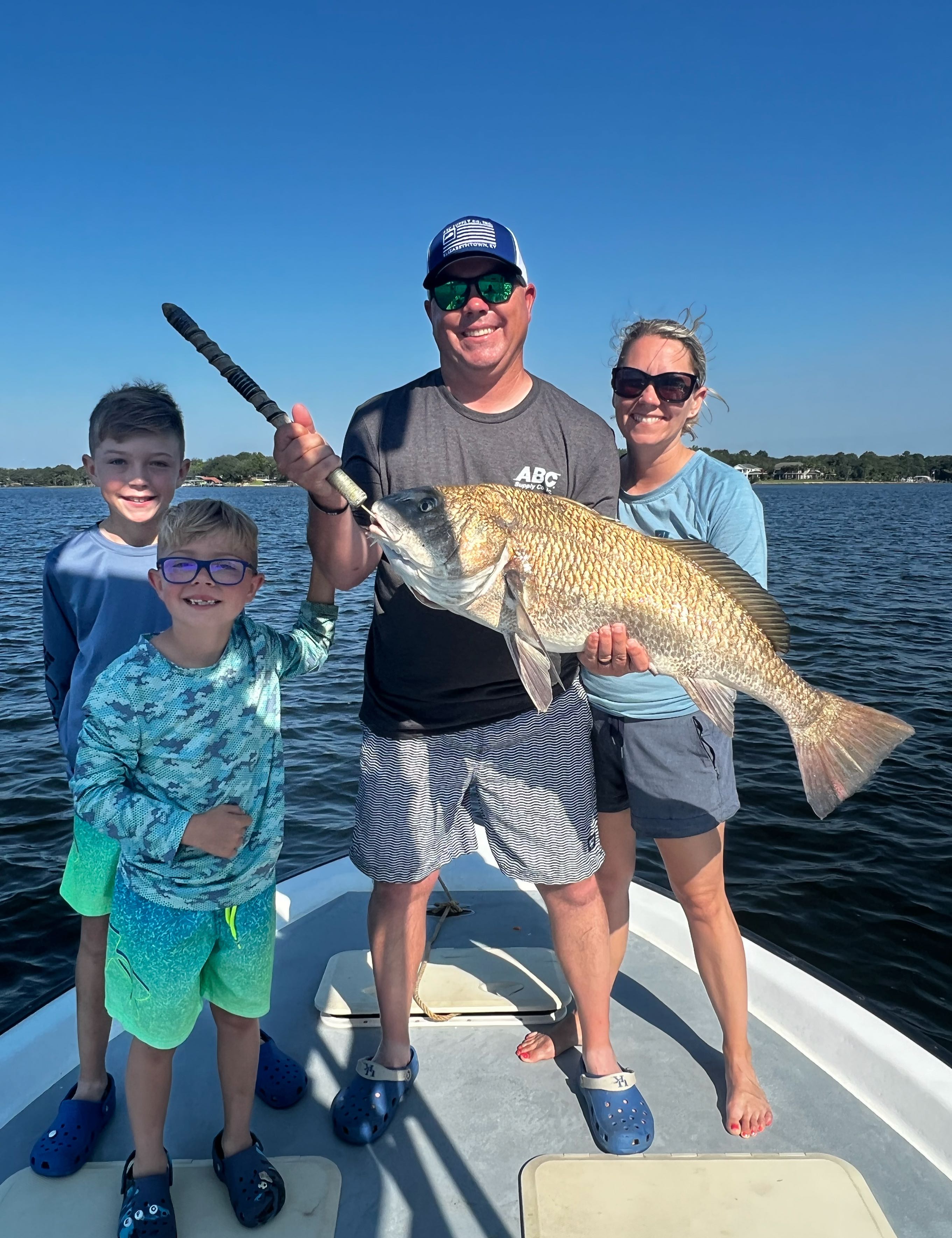 5 people enjoying fishing cruises in Fort Walton Beach