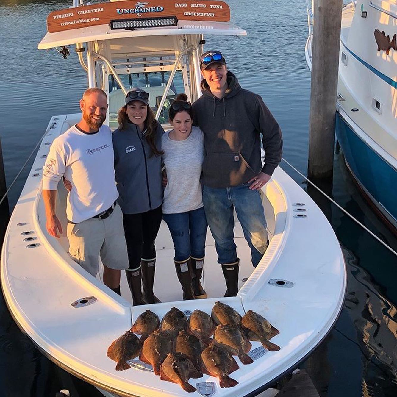 4 people fishing in MA