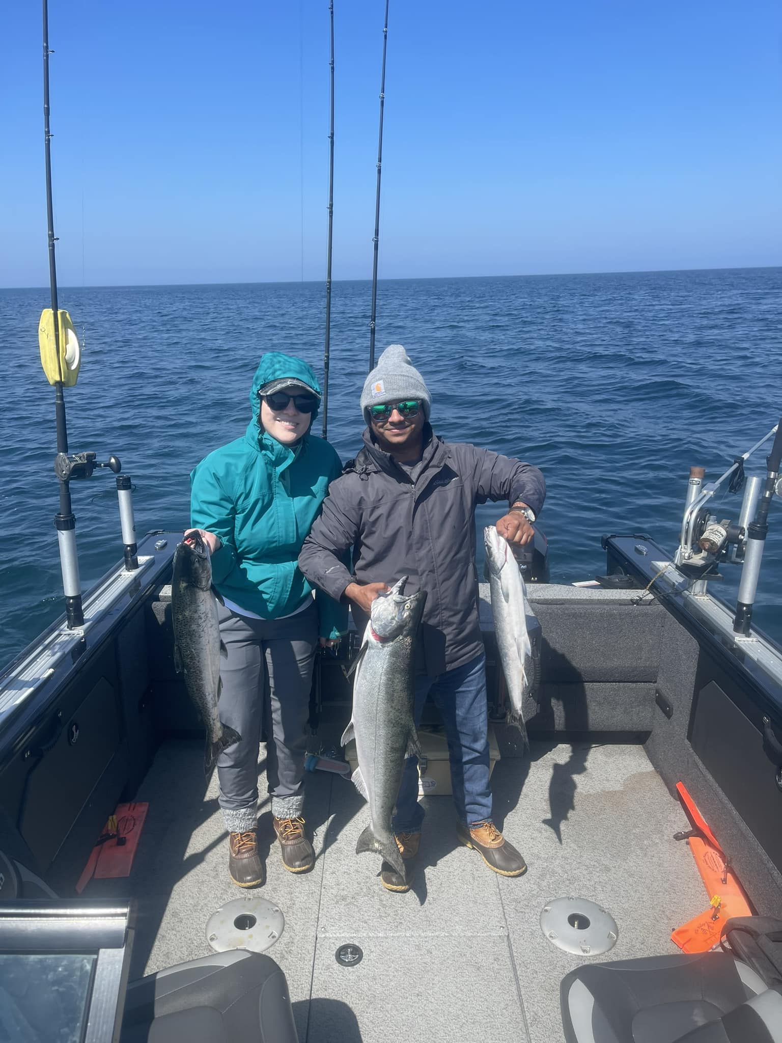 Three large fish caught by two people in Montague