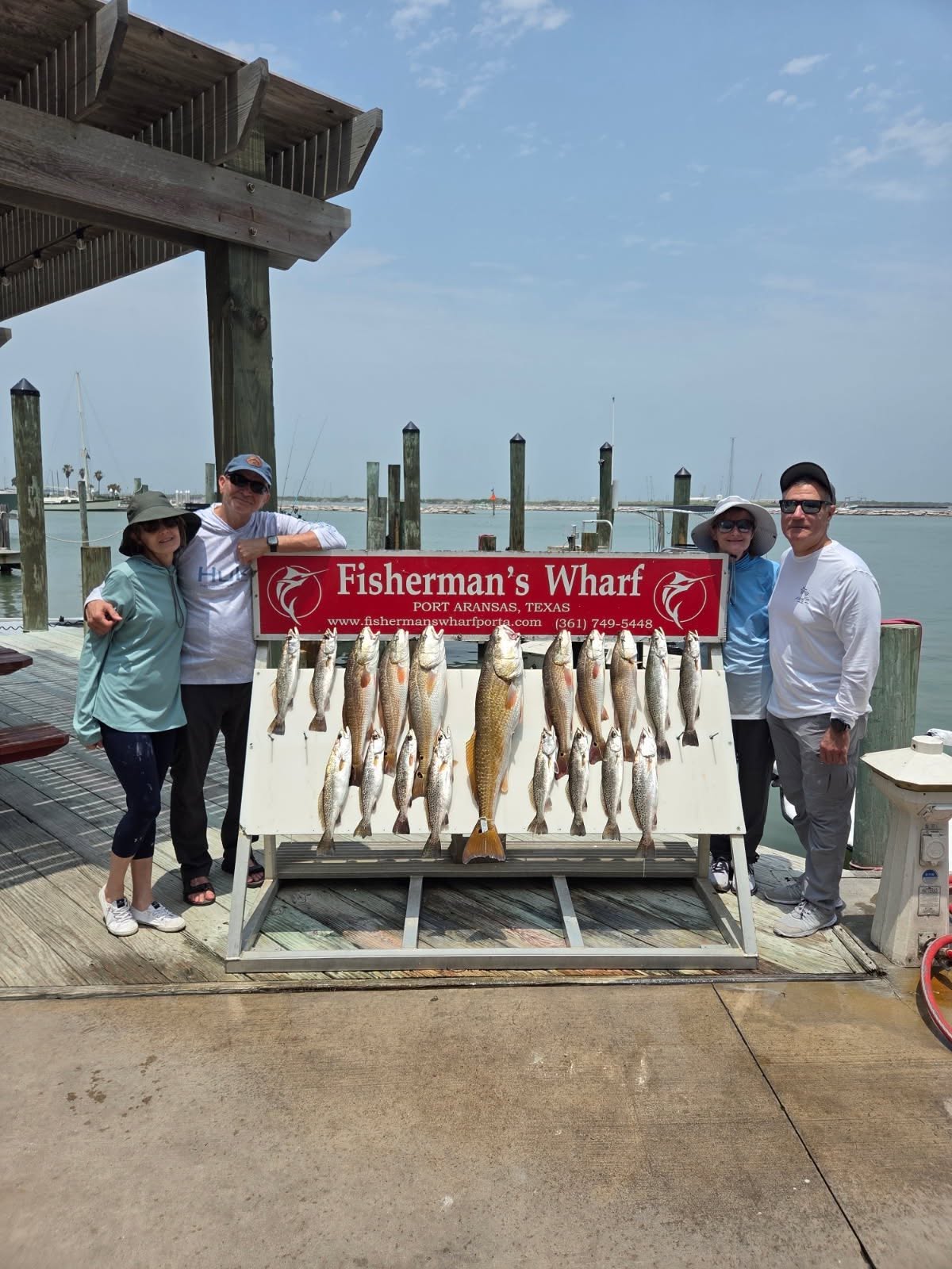 Successful redfish fishing trip display at Fisherman's Wharf in Aransas Pass Texas