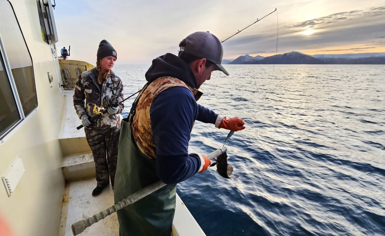 Two people fishing in Alaska