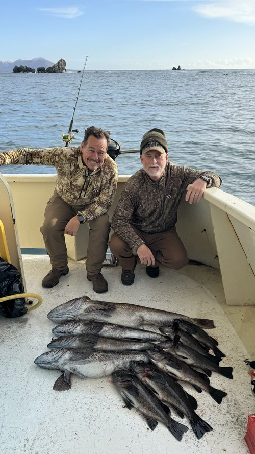 Two anglers with a big 29-inch catch in Sitka