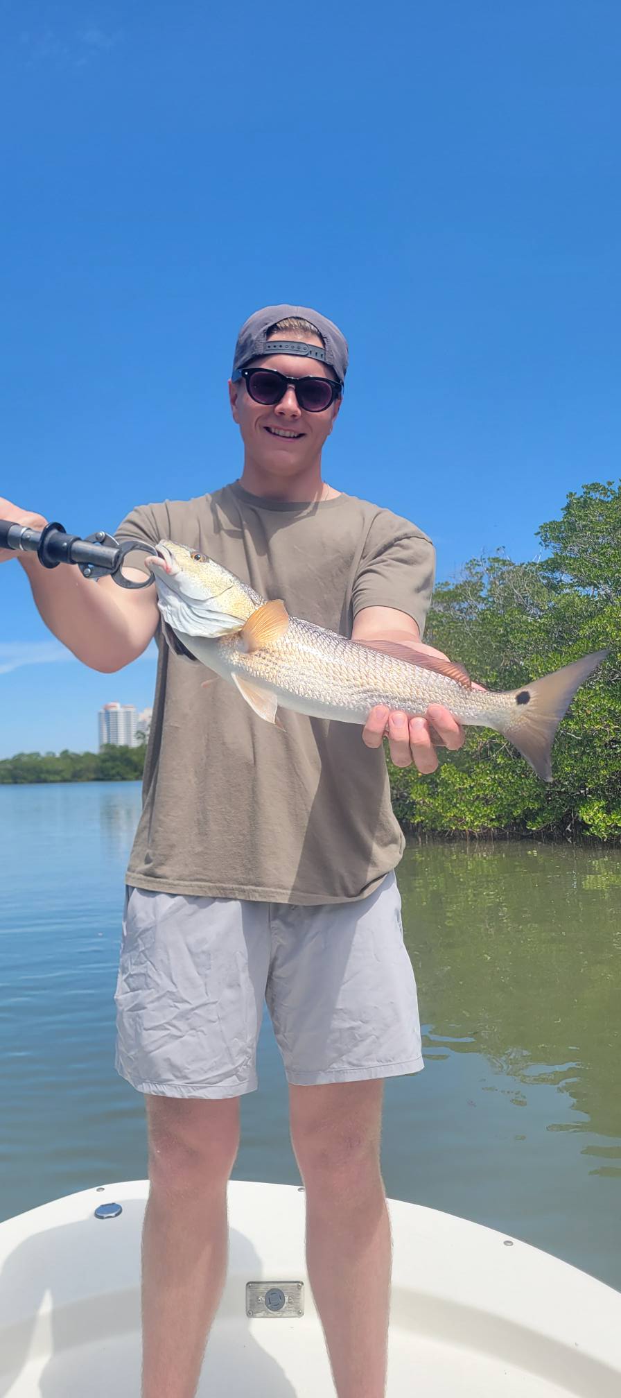 Redfish catch held on fishing boat in Bonita Springs FL