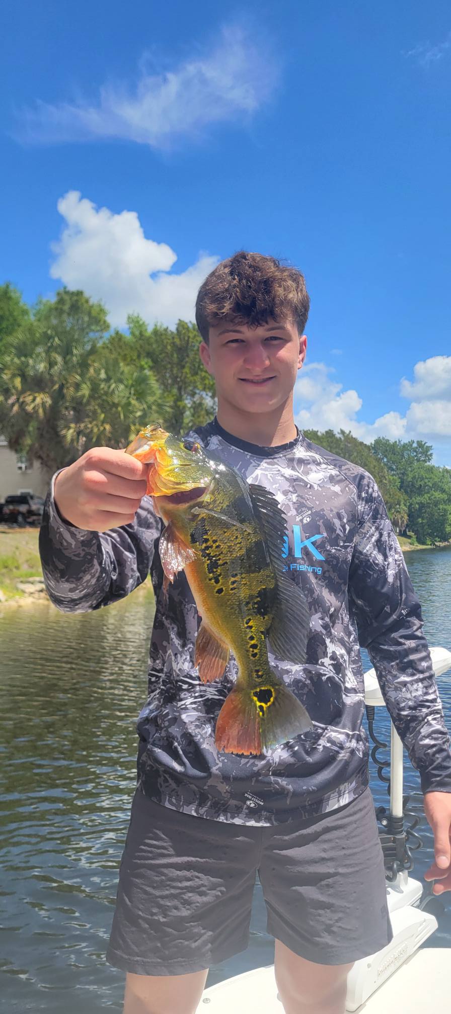 Peacock bass catch displayed while fishing in Bonita Springs FL