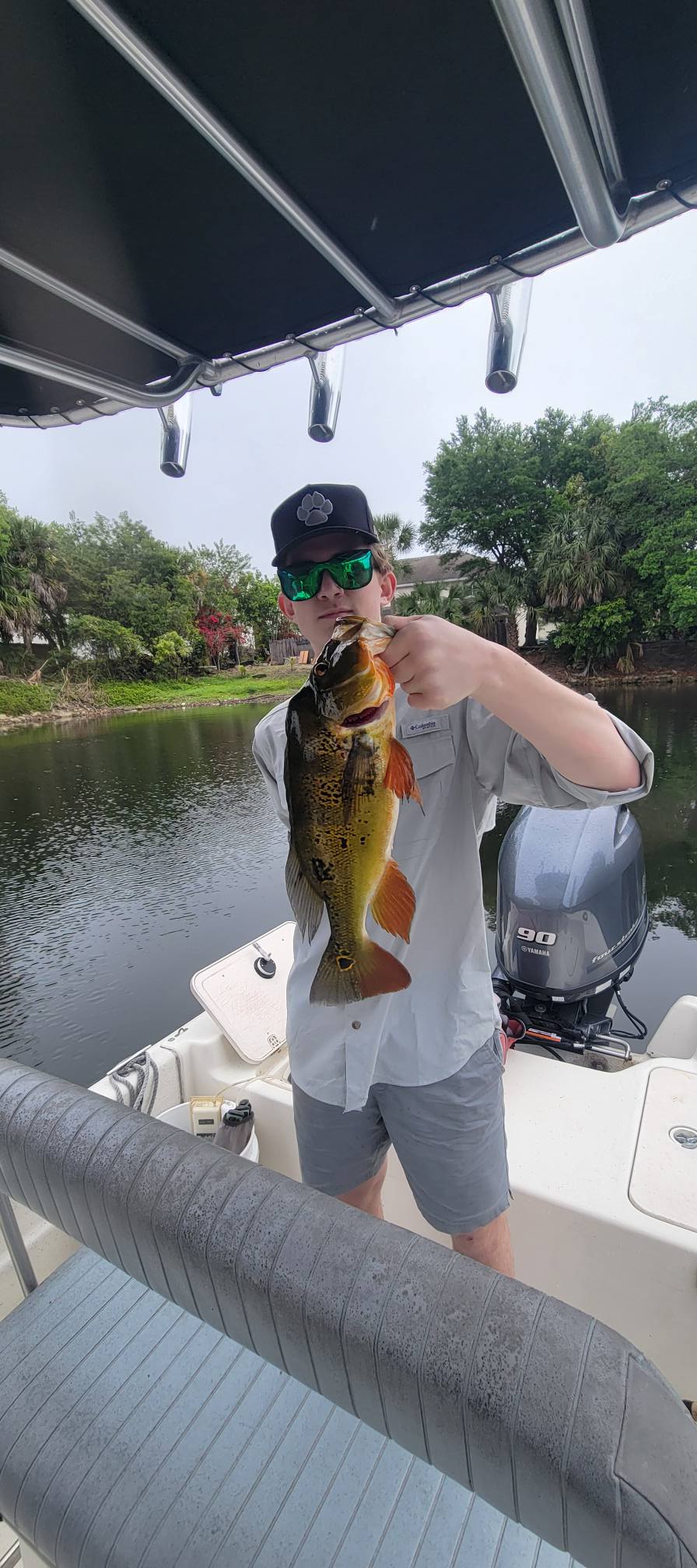 Peacock bass catch displayed on fishing boat in Bonita Springs FL