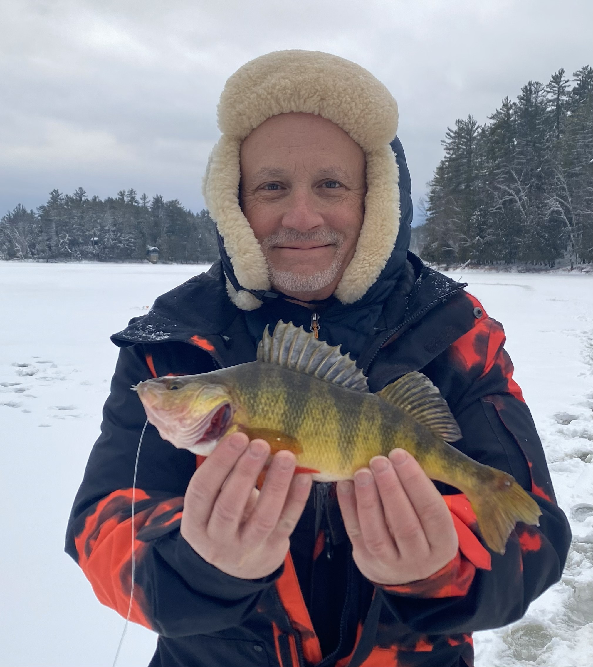 Person fishing in Evans Mills
