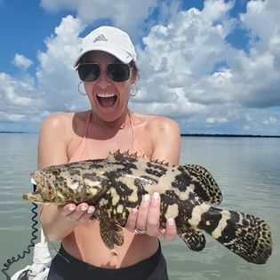 A person fishing in FL