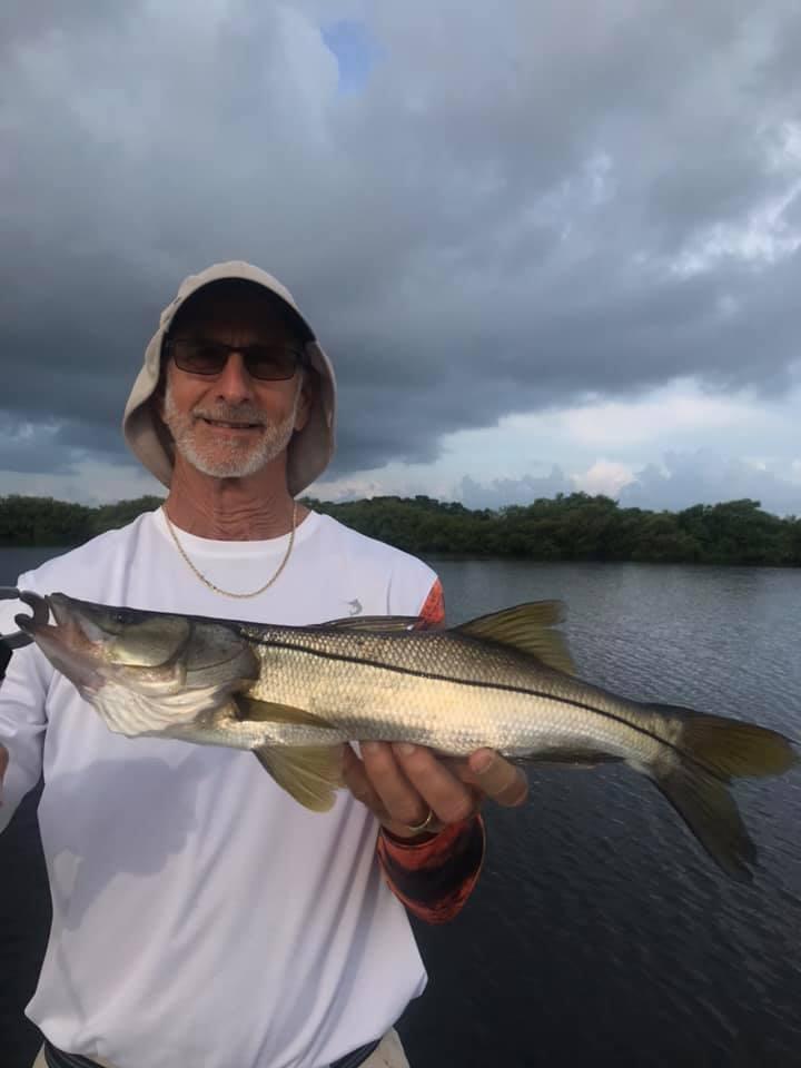 A lone snook, a 23-inch coastal sportfish, caught while fishing in Hernando Beach