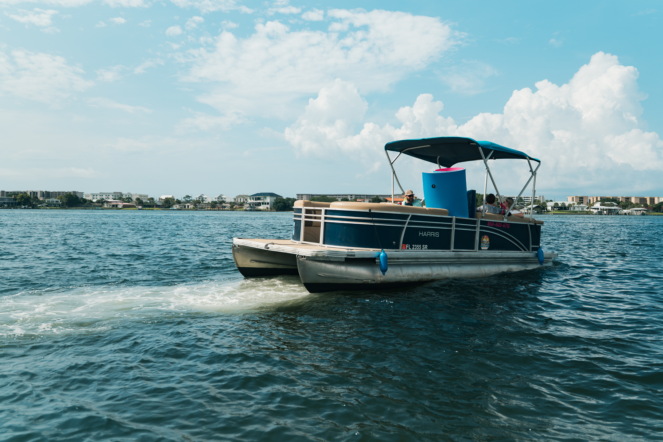 Pontoon boat rental on calm water for recreational boating adventure