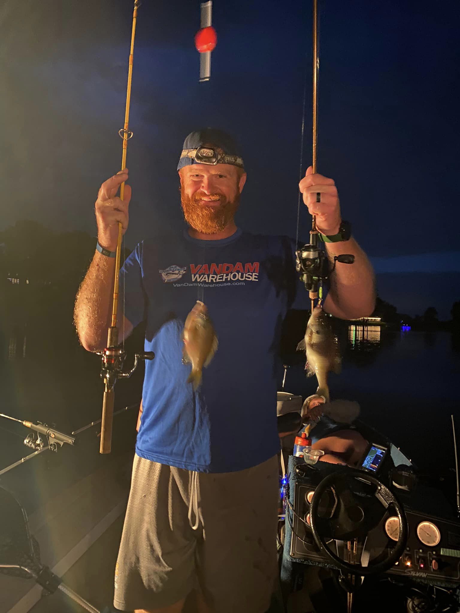 Couple fishing in MI with 2 small fish