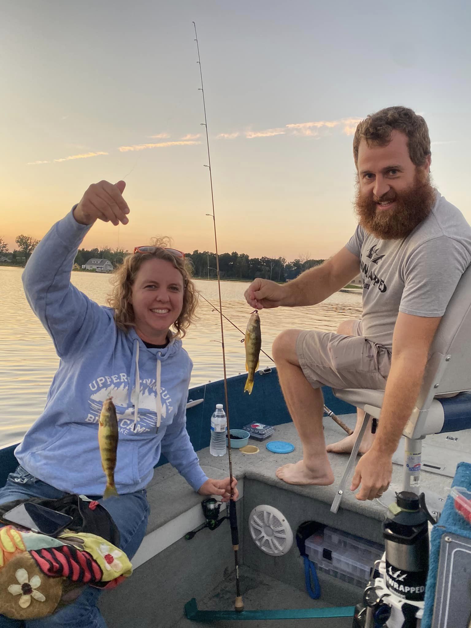 Two people fishing in MI