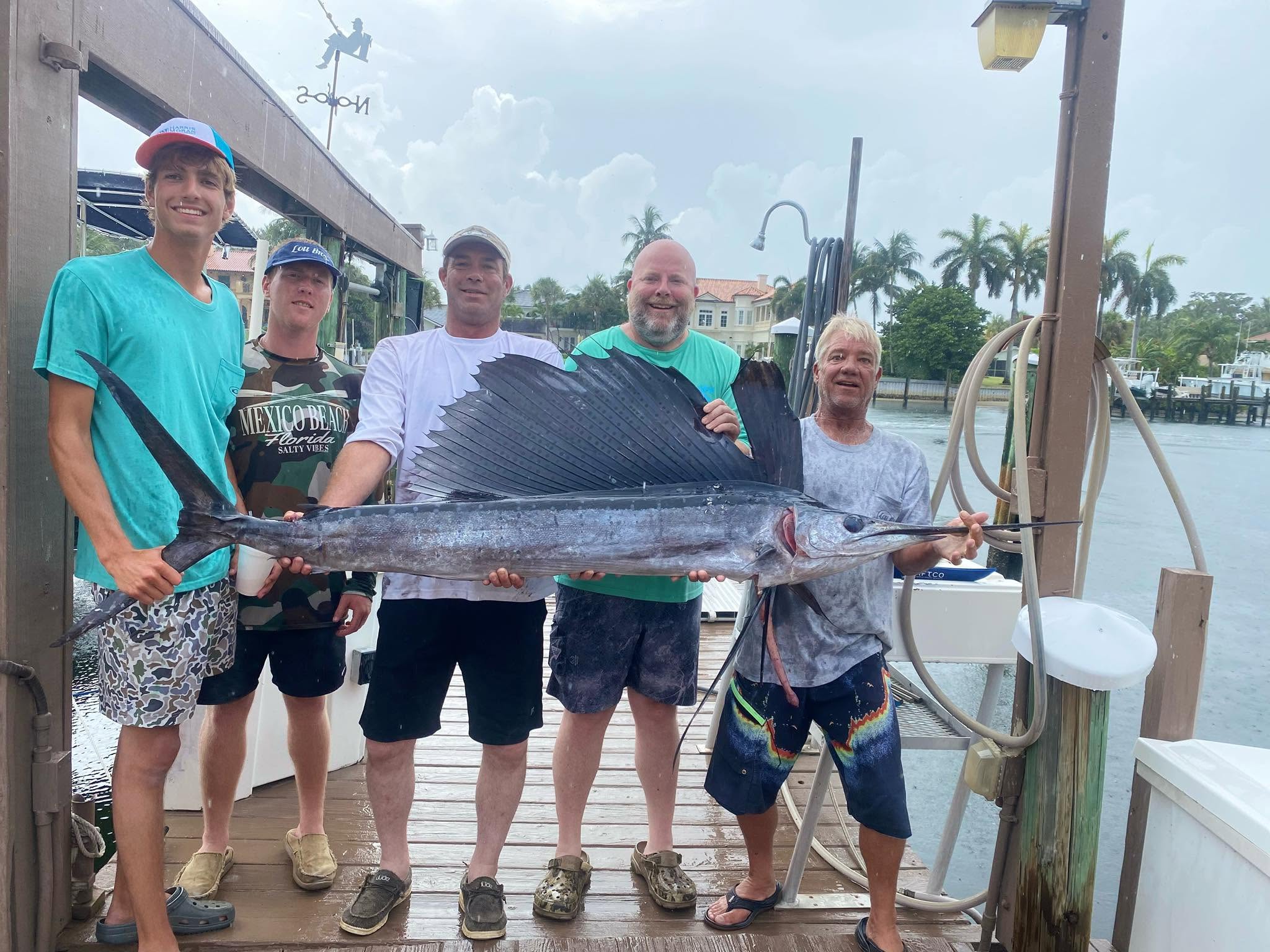 Angler with big 59-inch fish, fishing in FL