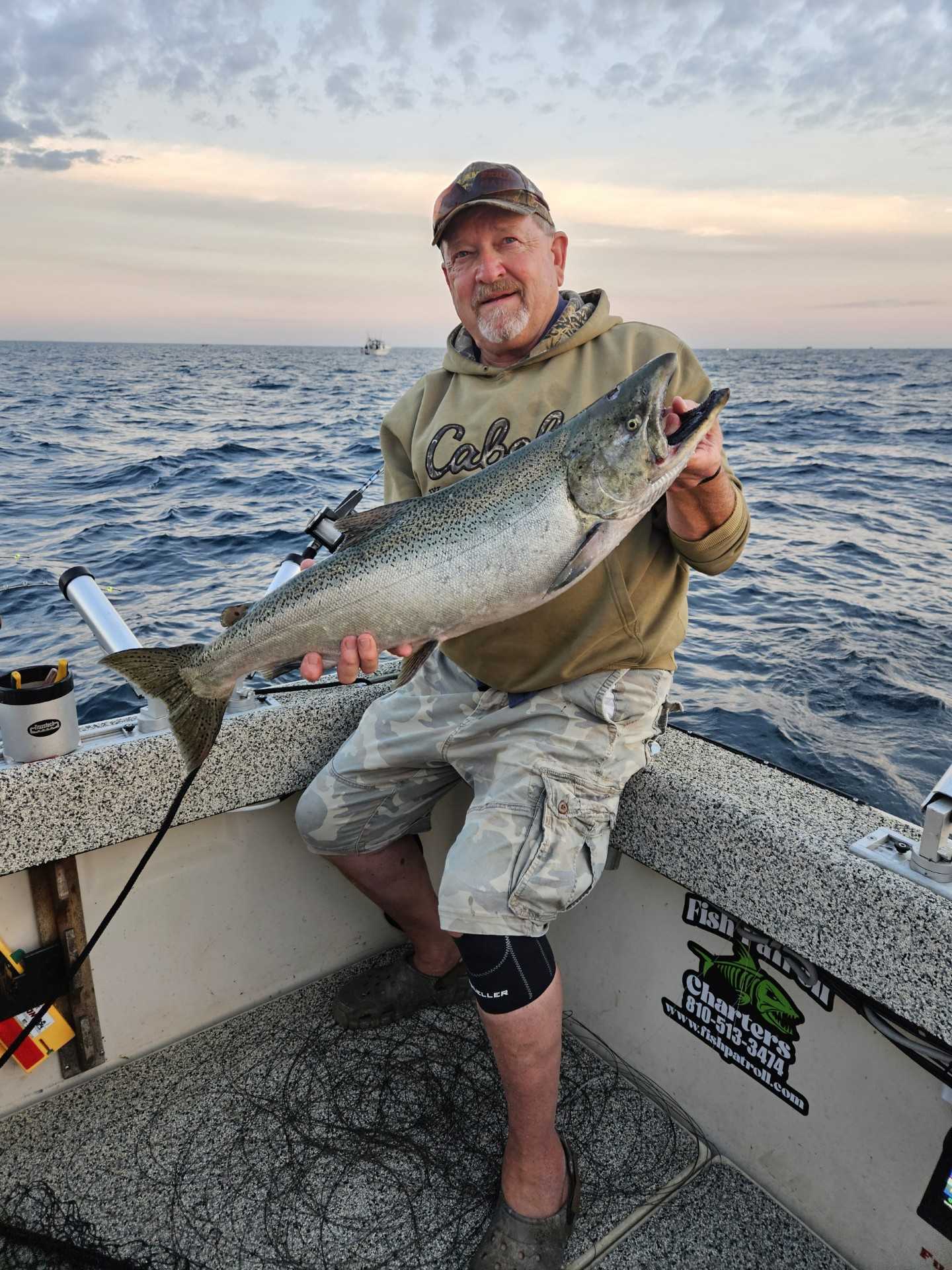 Chinook salmon caught while fishing in Manistee MI on boat deck