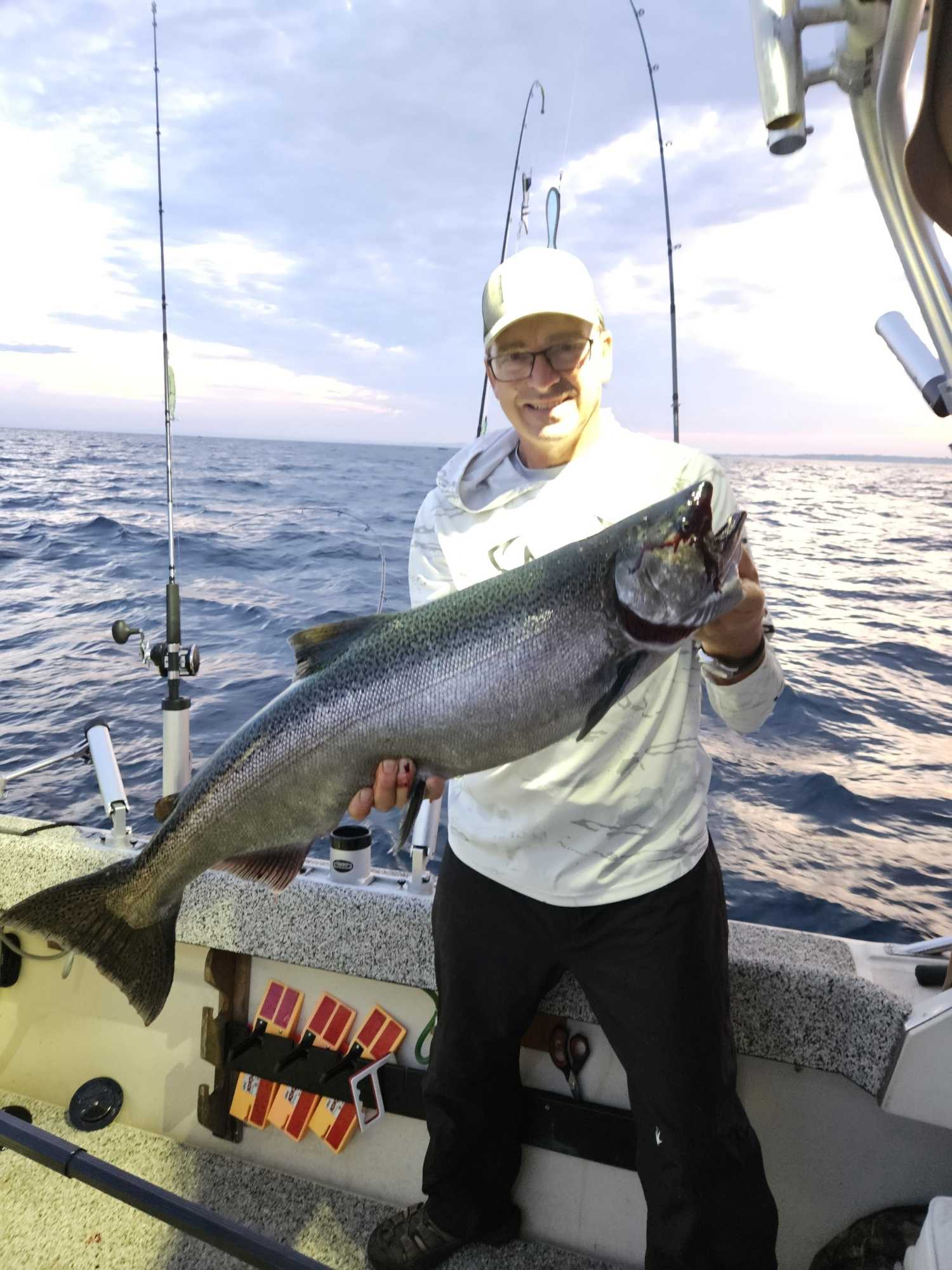 Large Chinook salmon caught during fishing trip in Manistee MI
