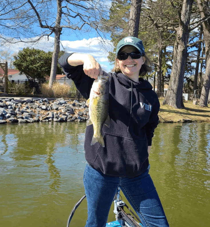 A lone angler fishing in the scenic waters of Virginia Beach